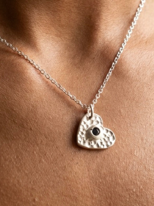 handcrafted_textured_heart_tanzanite_pendant_fine_silver