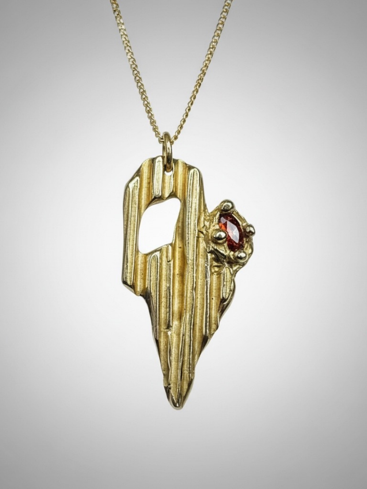 bronze_necklace_with_red_zirconia_gold_plated_chain
