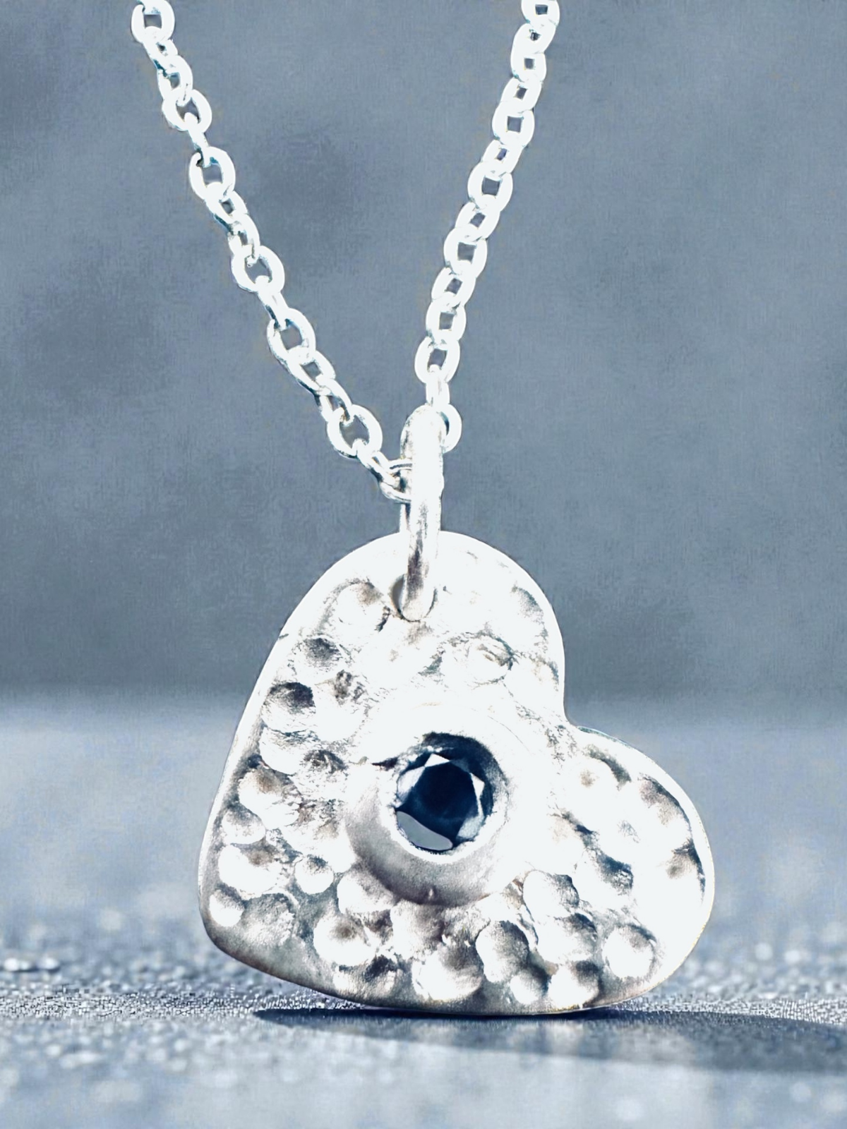 fine_silver_heart_pendant_with_tanzanite