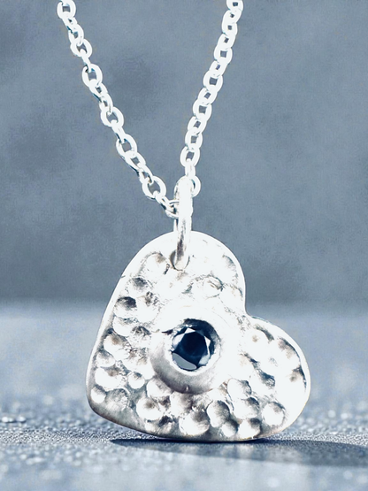 fine_silver_heart_pendant_with_tanzanite