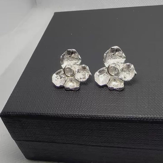 sterling_silver_flower_stud_earrings_minimal_design