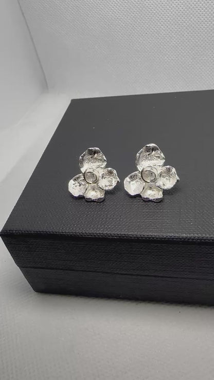 sterling_silver_flower_stud_earrings_minimal_design