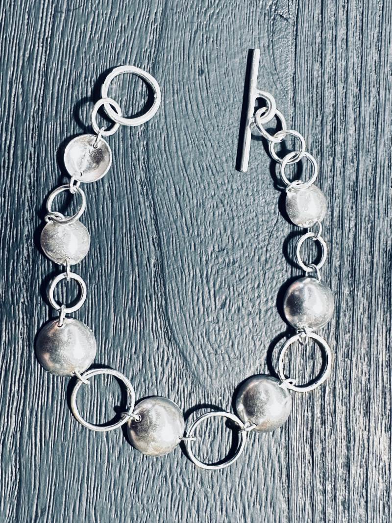 sterling_silver_bracelet_with_circle_and_disc_details