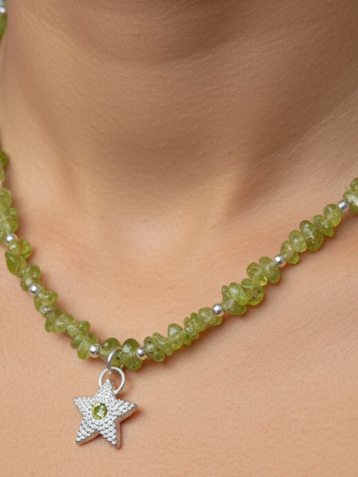 sterling_silver_star_pendant_with_peridot_gemstone